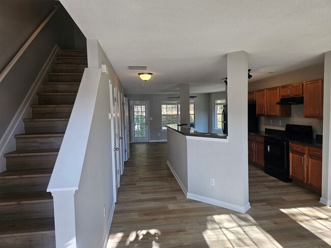 Building Photo - Move In special! 1/2 off the first Months rent!! 2 Bedrooms, 2.5 Baths Townhouse located in a Qui...