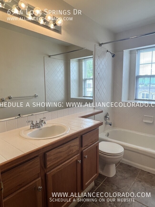 Building Photo - 6944 Lost Springs Dr