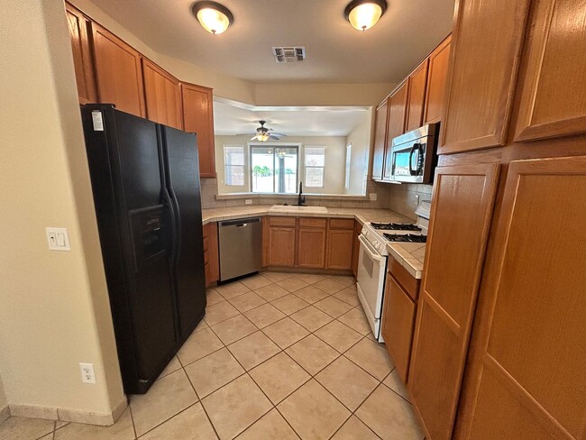 Building Photo - Move-In Special! Updated 3 Bed / 2bath Gilbert Home with New Paint, No Carpet and on the Course