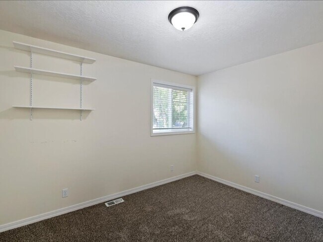 Building Photo - June Rent Free!!  Move Today!  Four Bedroom, Three Bath Home with Beautiful Backyard, Two Car Gar...