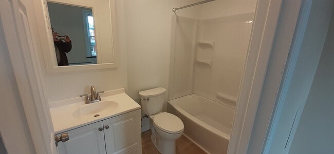 bath with entry from both master bedroom and living room - 7718 Brashear St