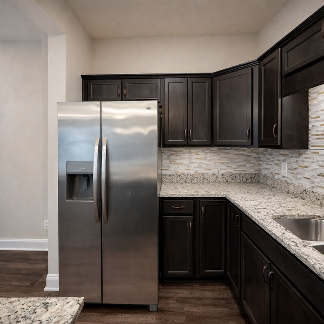 Building Photo - $250 OFF Move In Special! - Modern 3 Bedroom Townhome in Prime Location