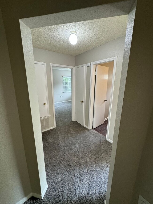 Building Photo - NICE 3 BEDROOM FEATURING WOOD VINYL PLANK ...