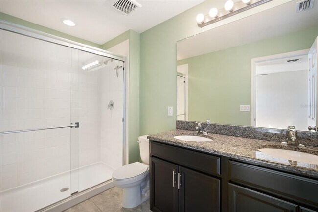Building Photo - 7042 Summer Holly Pl