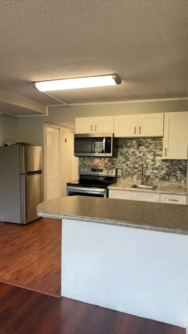 Building Photo - University Towers #414 - Walking distance to UT campus have your own place for $1190/month