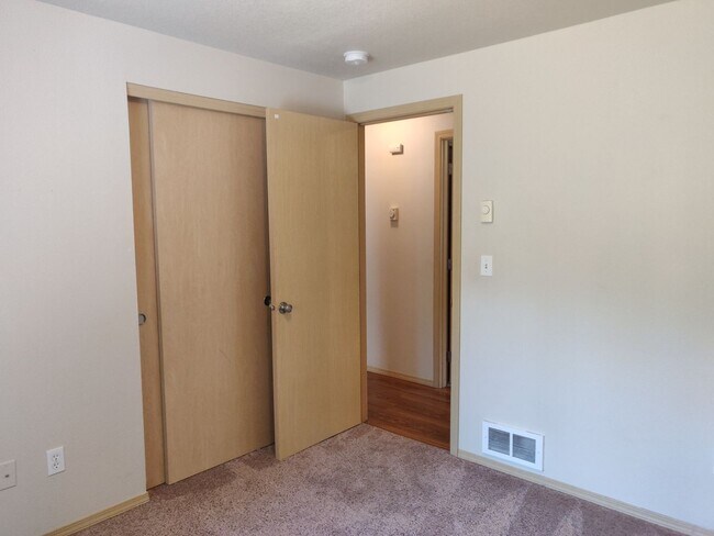 Building Photo - Charming 4-Bedroom Home on 1/2 Acre with a Fenced Backyard, Fully Insulated Double-Car Garage, in...