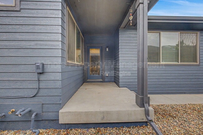 Building Photo - 9985 E 59th Ave