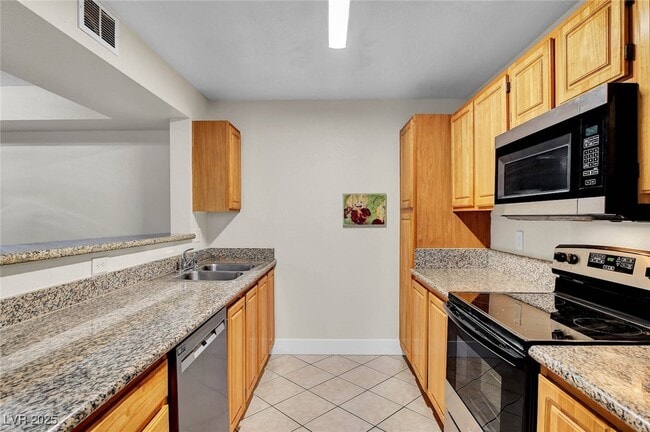 Building Photo - 5055 W Hacienda Ave