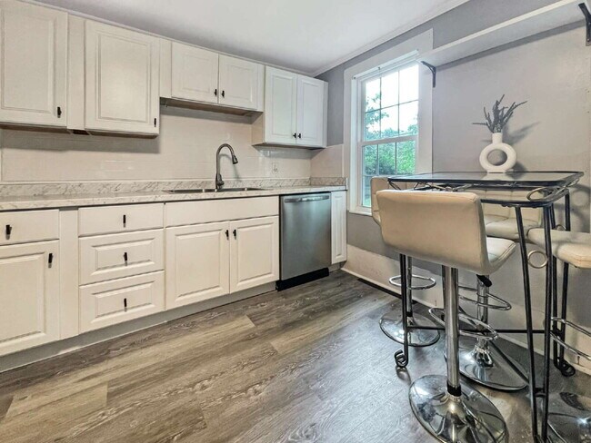 Building Photo - Seeking a roommate for a 2 bdr, 2 bath lower level condo with a porch and private yard, 1.5 miles...