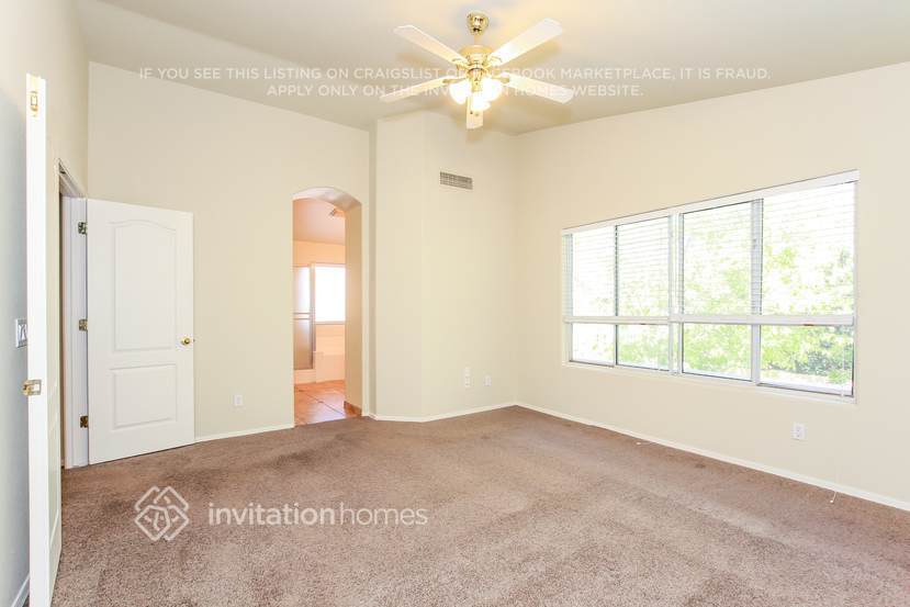 Building Photo - 8228 W Harmony Ln