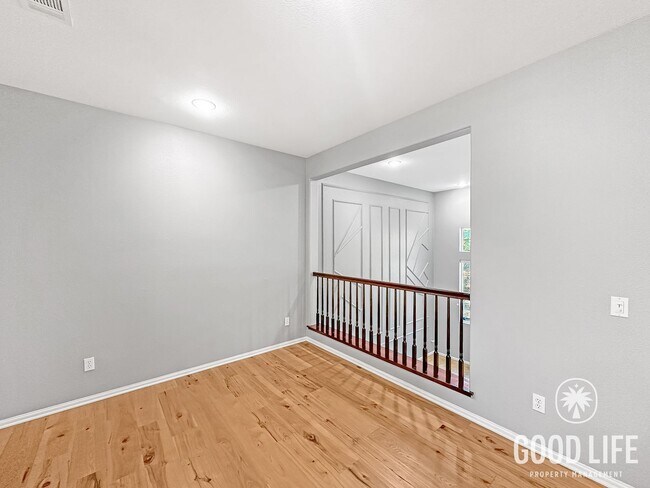 Building Photo - Elegant 3BR Residence in Exclusive Gated Community w/ AC & Garage!