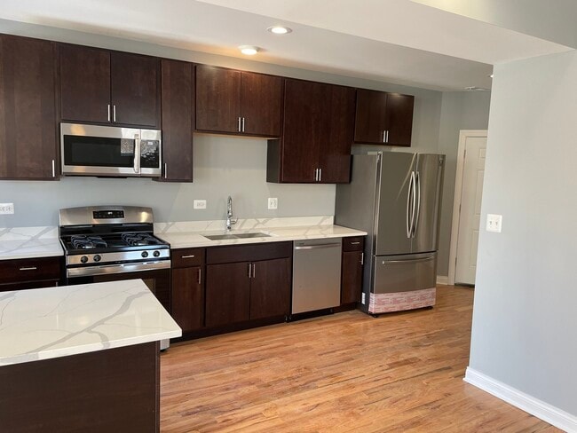 Building Photo - 1411 E 67th Pl
