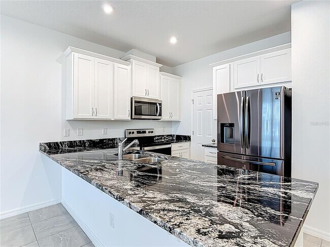 Building Photo - 2512 Blowing Breeze Ave