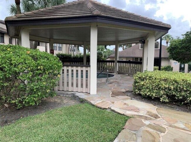 Building Photo - 1/1 Second Floor Remodeled Condo X Rent In...
