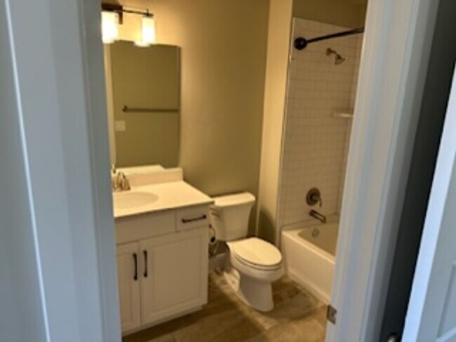Building Photo - 4 Bedroom Condo With a Community Pool and ...