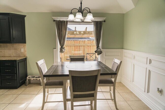 Building Photo - POOL - Elegant 4-Bedroom Home with Fenced Yard