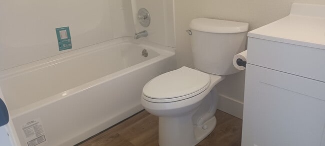 Building Photo - Updated 3 bedroom with A/C and Yard