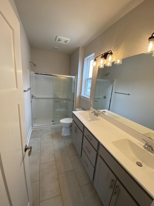 Building Photo - W218N16014 Tiger Lily Dr