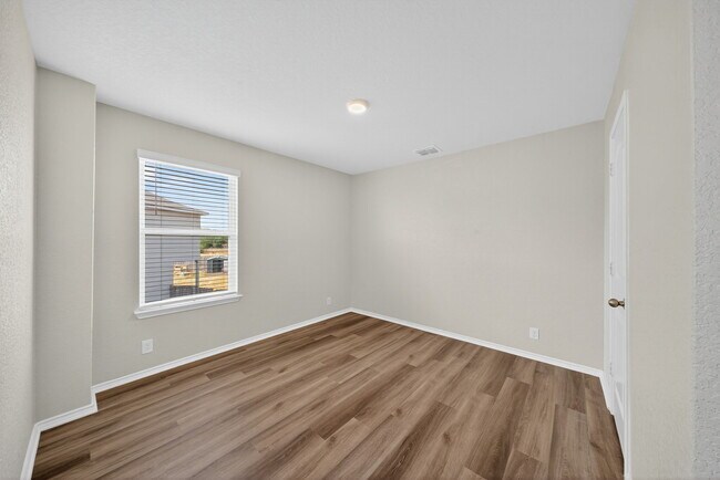 Building Photo - 8203 Rocky Pebble