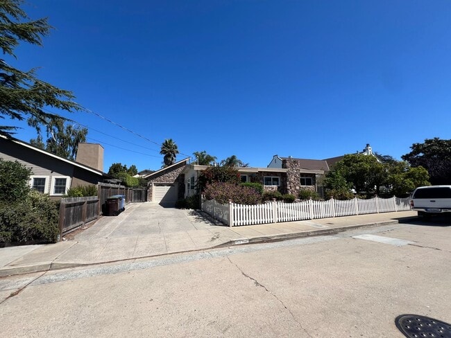 Building Photo - Spacious 4-Bedroom Retreat Just Steps from...
