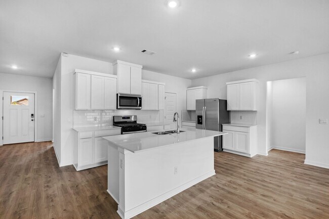 Building Photo - Stunning New 4-Bedroom Home with Modern Up...