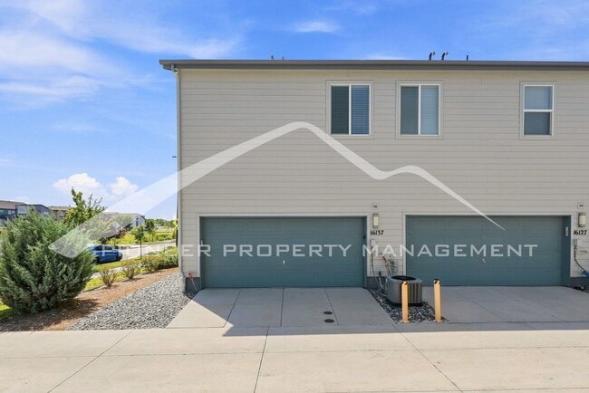 Building Photo - Spacious Townhouse with Central AC and 2-Car Garage