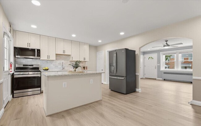 Building Photo - Updated 3BR Catonsville Townhome | Rear Parking + Deck