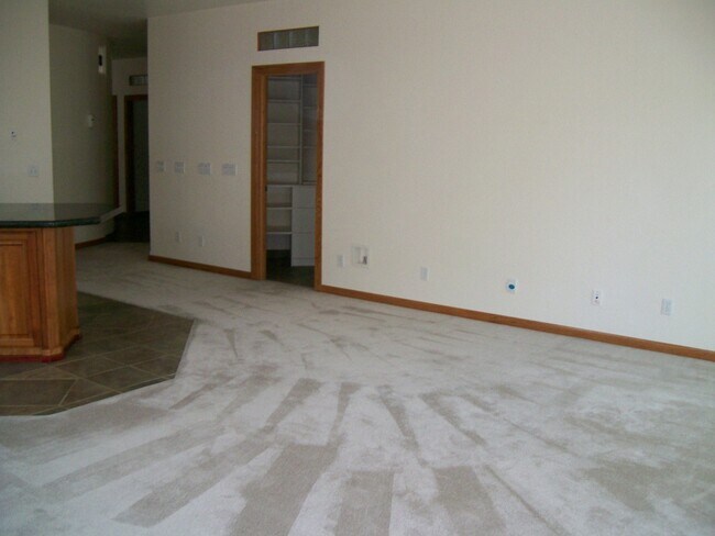 Building Photo - Centrally Located Custom Home each bedroom...