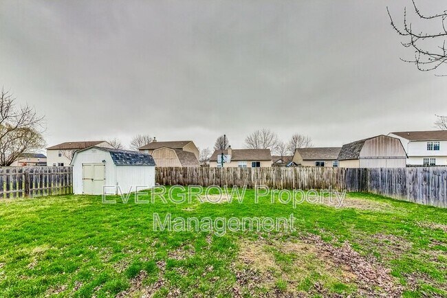 Building Photo - 1115 Spend a Buck Ct