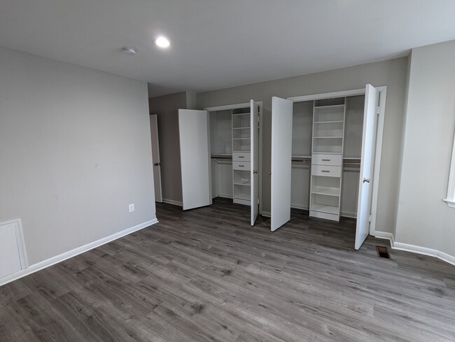 newly constructed organized closet system - primary bedroom, top level - 205 Bates St NW