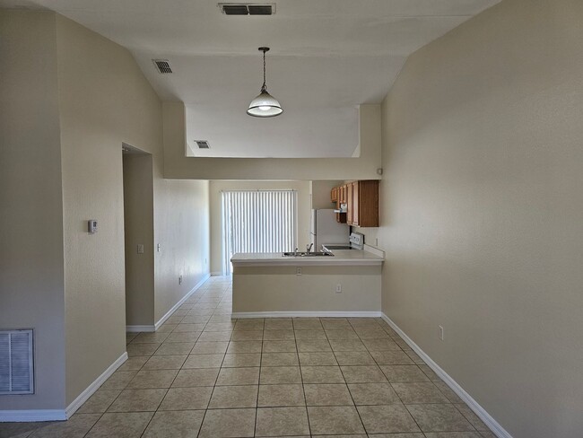 Building Photo - COMING SOON!   CUTE!  3 BEDROOM / 2 BATH - HALF DUPLEX (DELTONA)