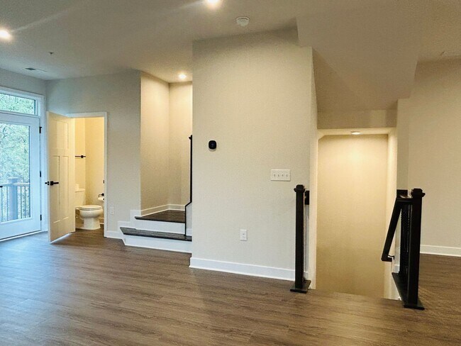 Building Photo - New Construction • 4 BR • 2 Full / 2 Half BA • End Unit Townhome in Village Town – Fayetteville’s...