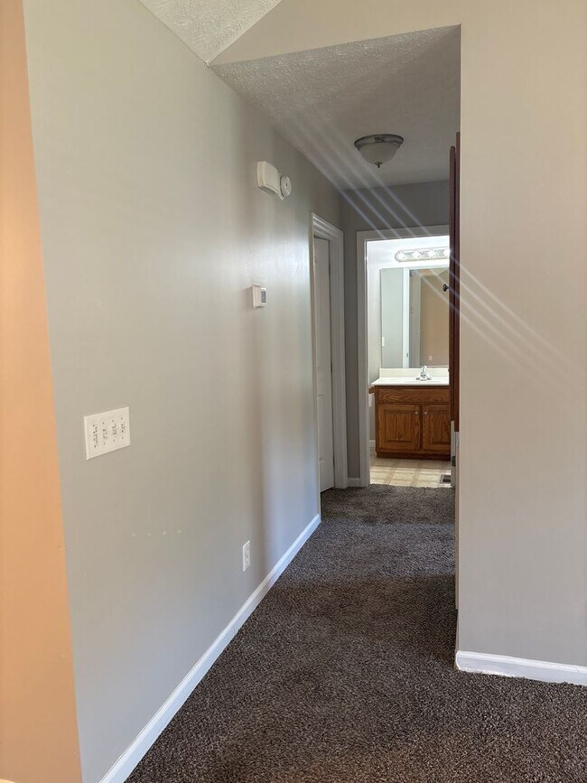 Building Photo - Charming Home with Covered Back Deck and Fenced in Yard...