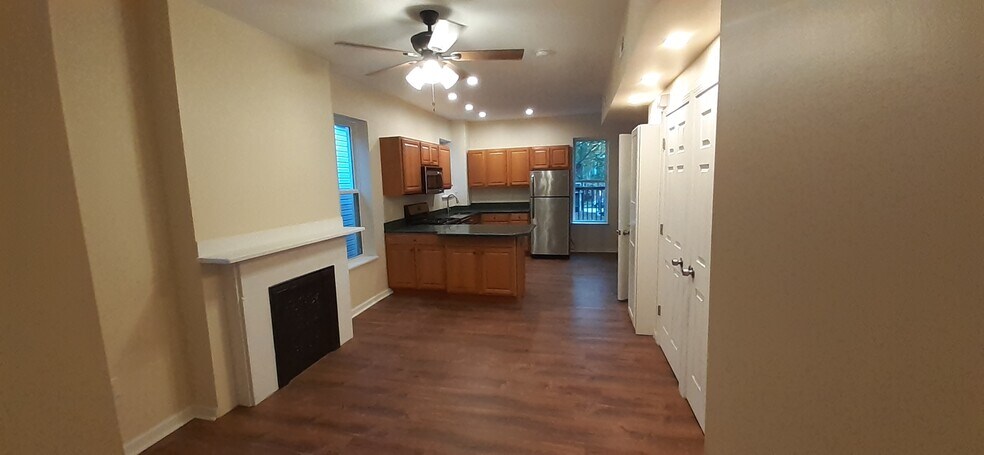 looking back at kitchen from door of front bedroom - 7718 Brashear St