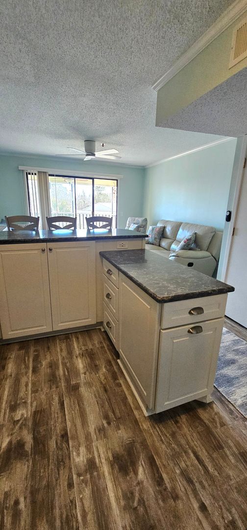 Building Photo - Dreamy Little River Condo — Furnished, Elevator Access, Pool & Marina Nearby!