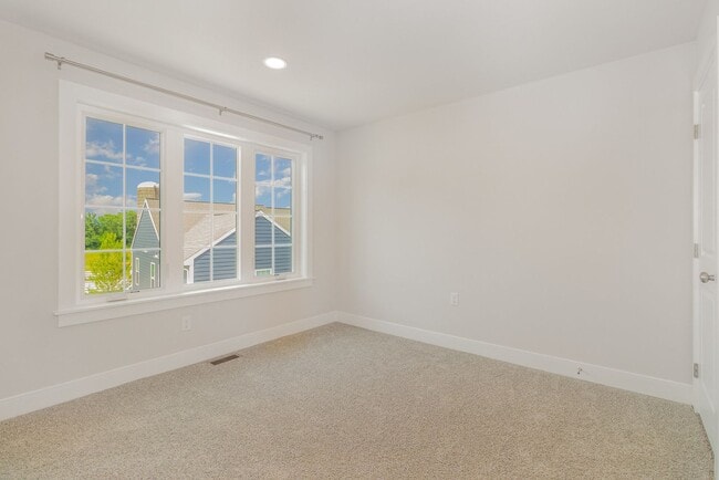 Building Photo - Modern 2025 Townhome | Open-Concept Living, Chef’s Kitchen with Large Island & 2-Car Garage
