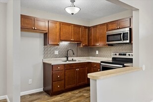 Building Photo - The District Apartments