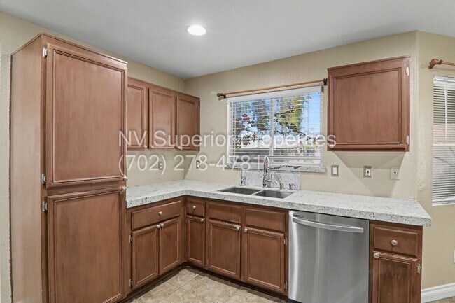 Building Photo - NW!! 4 bedrooms!! Bed & Bath DownStairs!!! RV Parking!!! Synthetic Grass Front yard!! Real Grass ...