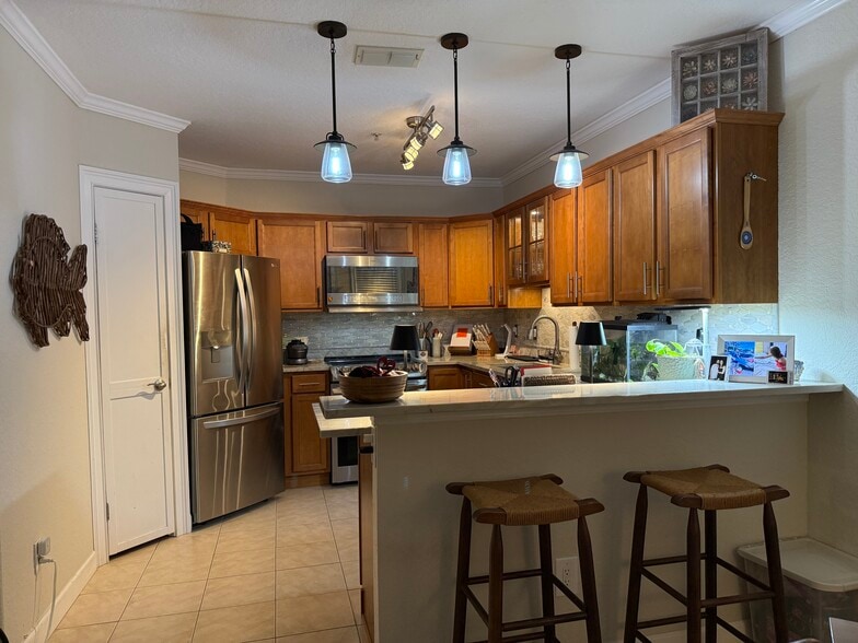 Kitchen, view from dining room - 1701 The Greens Way