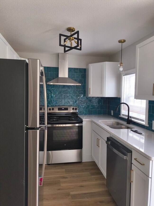 Building Photo - Welcome to Your Next Home with Harvest Investments!