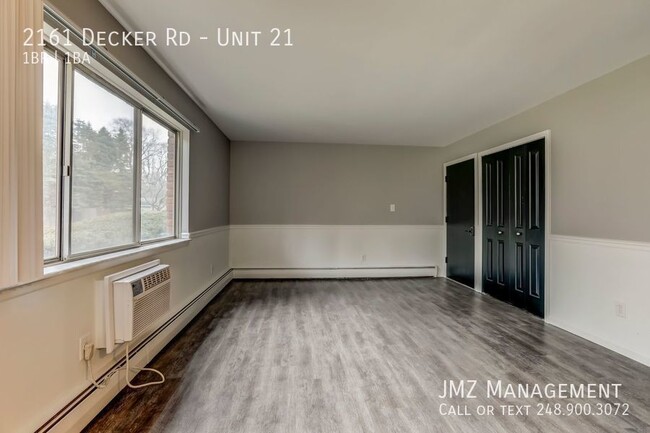 Building Photo - BEAUTIFUL UPDATED APARTMENT IN WALLED LAKE!