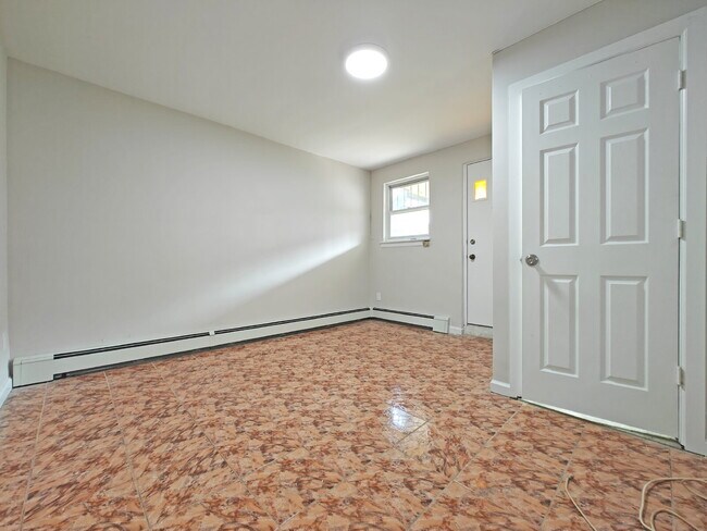 Building Photo - Spacious Fully Renovated Corner-Home Available Now!