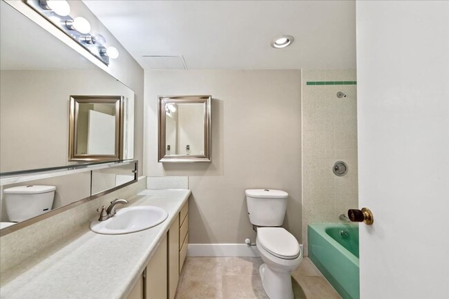 Building Photo - Stylish Imperial Plaza Condo in Prime Downtown Location