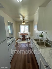 Building Photo - 2030 E Florence Ave