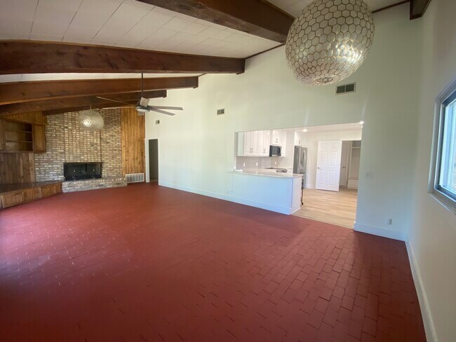 Open Floor Plan with Red Brick Floors - 4714 29th St