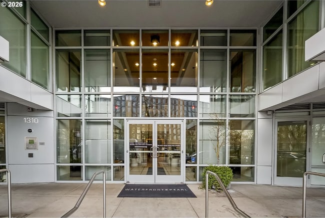 Building Photo - Exquisite Condominium at the Renowned Waterfront Pearl with Views of the River, Work Out Facility...