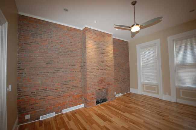 Living room with gas fireplace - 3515 Penn Ave