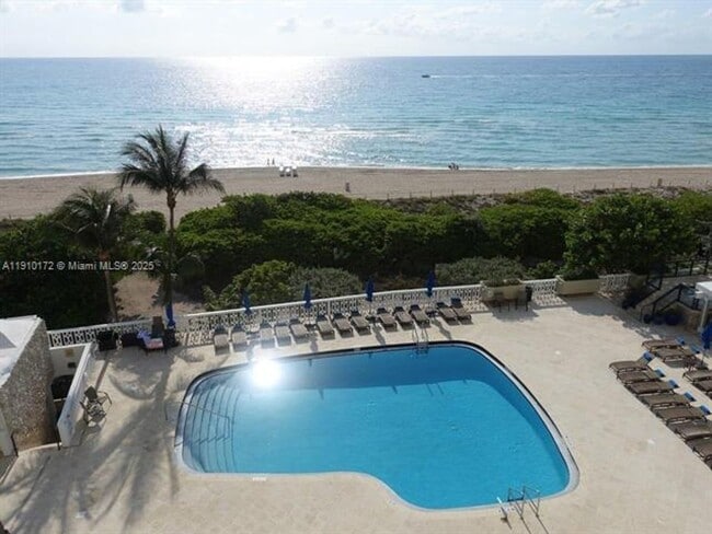 Building Photo - 5555 Collins Ave