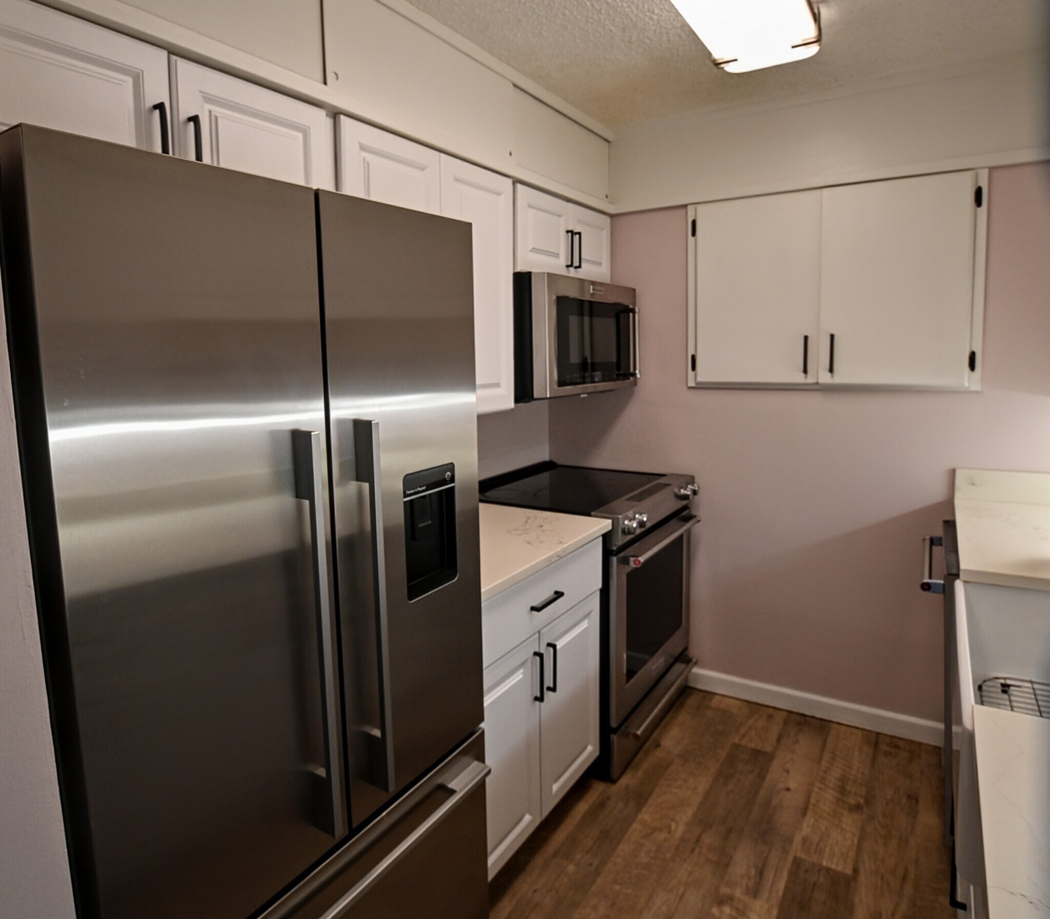 Kitchen w/ high-quality SS appliances & lots of storage - 3711 26th Pl W