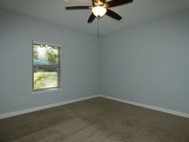 Building Photo - Spacious 3-Bedroom Home - Half Acre Lot